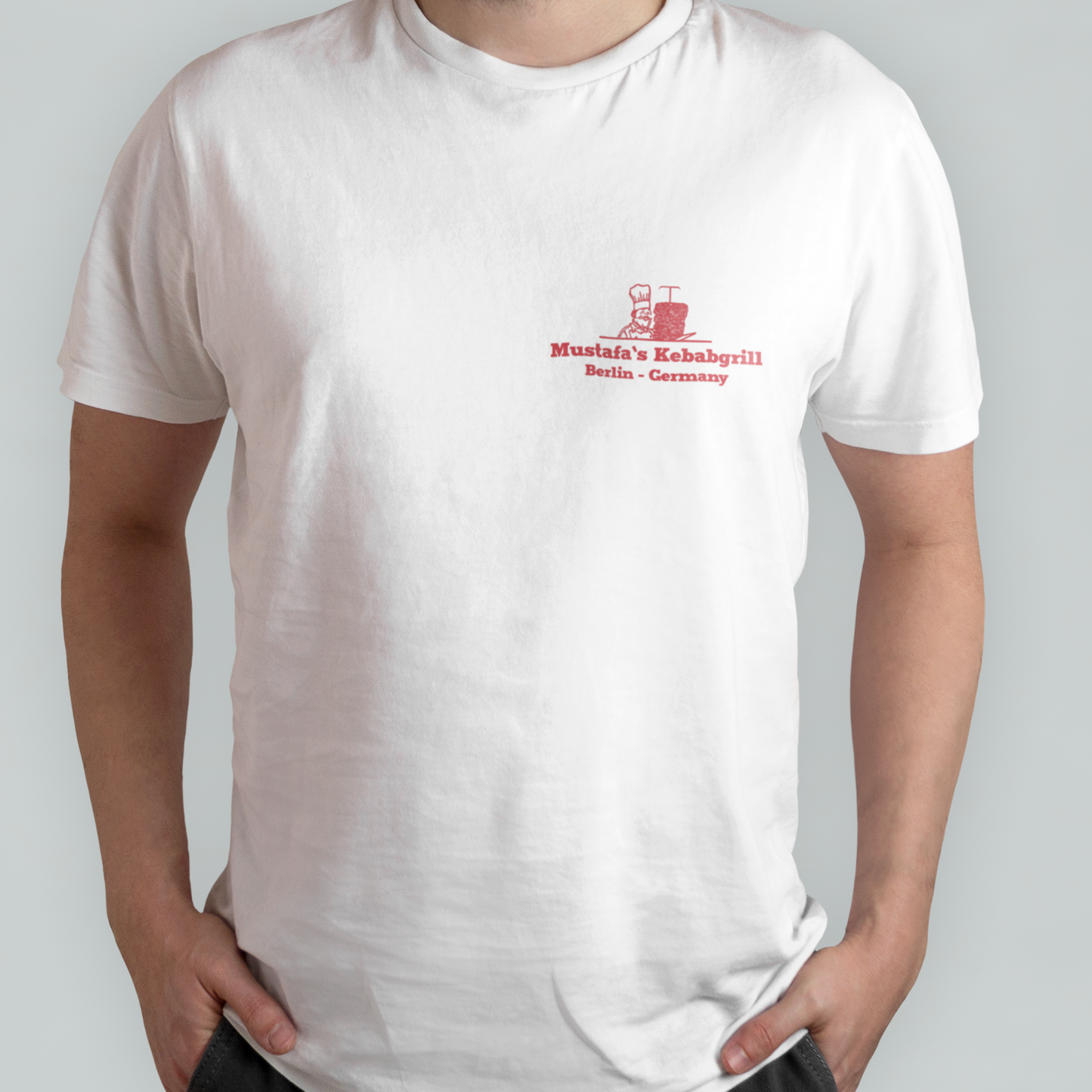 Mustafas Berlin Kebab - Unisex Shirt aus qualitativer Bio-Baumwolle - Rücken- & Frontprint